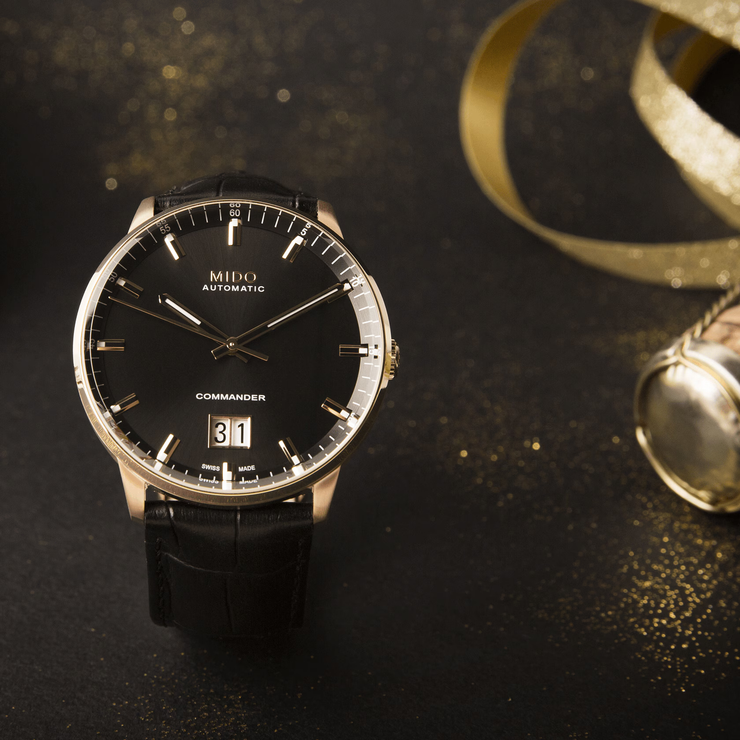 Mido Commander Big Date (noir, or rose, bracelet cuir)